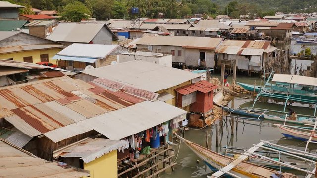 Coron bay with poor slums area. Philippines. Busuanga island.