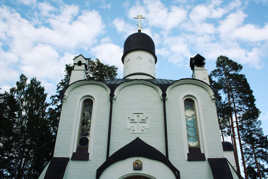 The skete of Smolensk icon of Our Lady. View from below. Aged photo. A point of view shot. Beautiful churches. Smolensk Skete. Island of Valaam, Republic of Karelia, Russia.