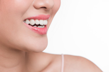 Fototapeta premium Beautiful smile young woman isolated on white. White teeth.