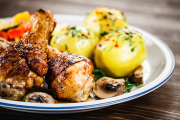 Roast drumsticks with potatoes