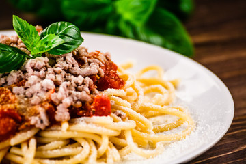Pasta with meat, tomato sauce and vegetables