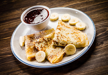 Crepes with bananas and cream
