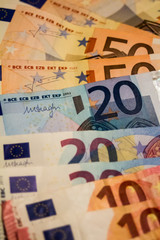 Fototapeta na wymiar A composition of euro banknotes providing great options to be used for illustrating subjects as business, banking, media, etc.