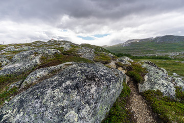 path hiking adventure storm clouds