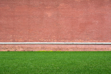 Texture, brick wall and green grass