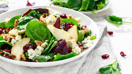 Fresh Pears, Blue Cheese salad with vegetable green mix, walnuts, cranberry. healthy food
