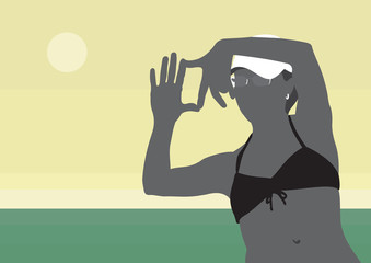 The girl in the hat by the sea. Girl in a black bathing suit on a background of the sea landscape.