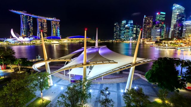 Night Cityscape Of Singapore 4K Time Lapse (tilt up)