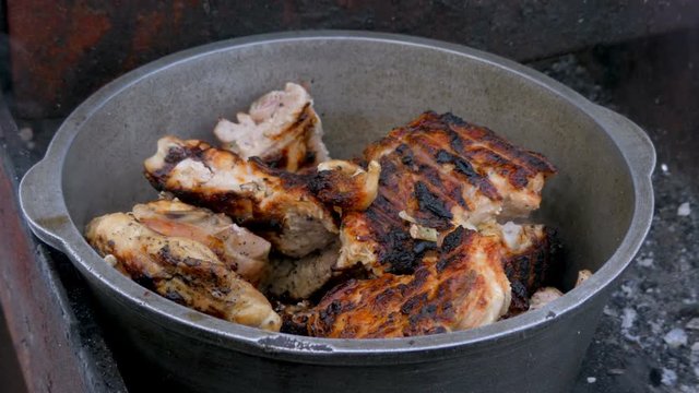 Fried meat in a saucepan