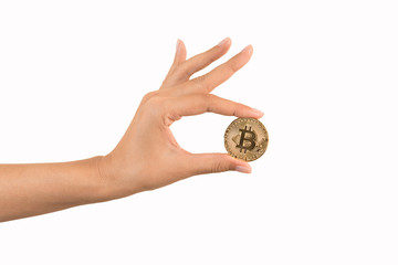 Fototapeta na wymiar Hand holding the Bitcoin on white background.