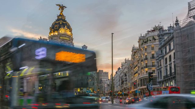 Madrid gran via street traffic timelapse during twilight rush hour spain