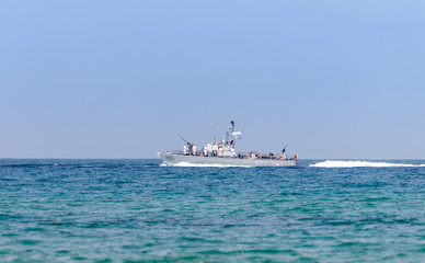 A combat ship is participating in a maritime parade off the coast of Haifa in honor of the 70th...