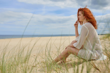 Young woman on sand to beautiful beach, Baltic Sea, Poland