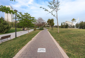 Obraz premium Road sign on the cycleway, bikeway for cyclists only. Bike lane in the Turia River gardens in Valencia Spain