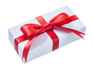 White wrapped gift box with red bow isolated on white
