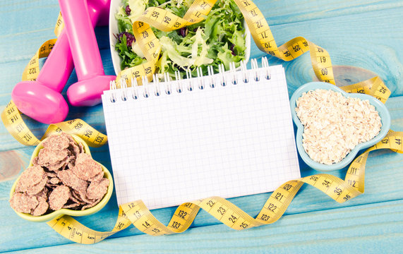 Diet plan, menu or program, tape measure, dumbbells and diet food, weight loss and detox concept.