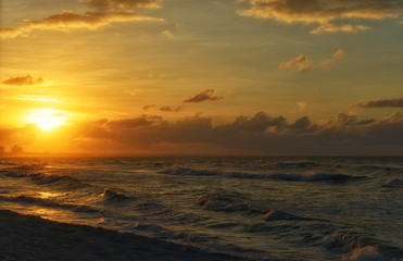 caribbean sea storm at sunset time