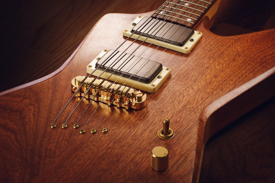 Close up on the body of electric guitar with natural finish, dark wooden background
