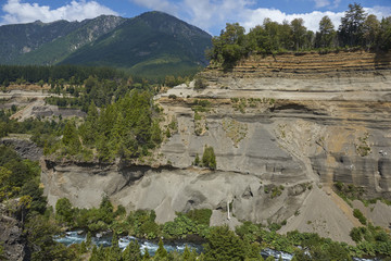 River Truful-Truful running through a deep gorge with colourful eroded cliffs in Conguillio...