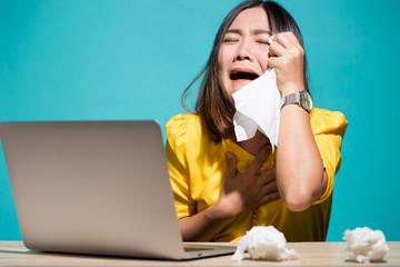 Woman so sad when she look at laptop