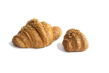 Croissant with almonds on white background