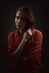 Dramatic portrait of a young beautiful woman