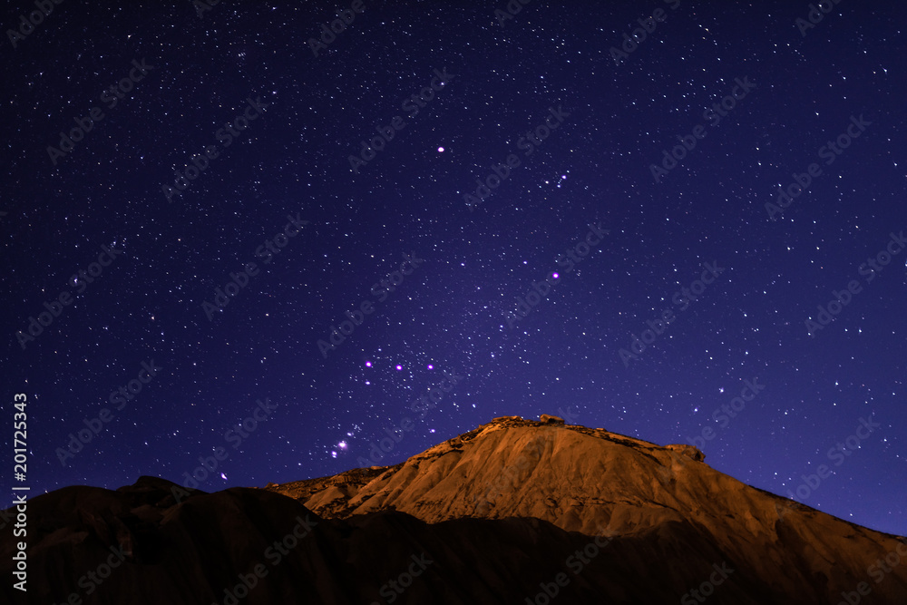 Wall mural mountain peak in starry night