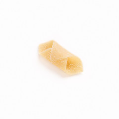 One garganelli pasta isolated on white