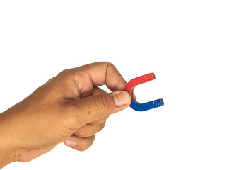 hand hold magnet on white background.