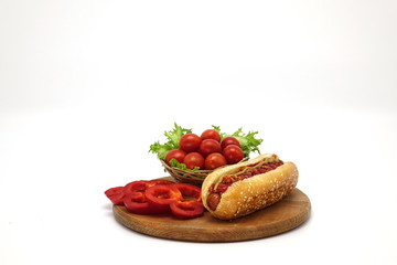 Hot dogs and French fries on white background.