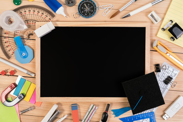 Top view flat lay. Blackboard concept for put text back to school or congratulations with school education accessories. Education background concept.