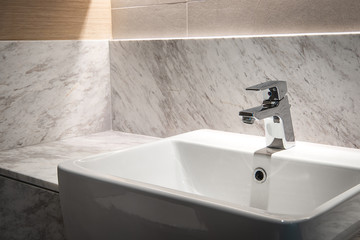 Bathroom interior with sink and faucet