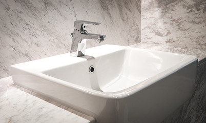 Bathroom interior with sink and faucet