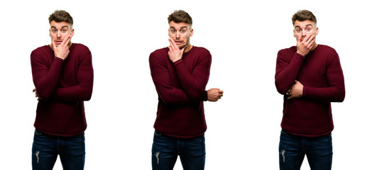 Handsome blond man scared in shock, expressing panic and fear isolated over white background