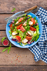 Vegetable salad with chicken meat. Salad with fresh vegetables and grilled chicken fillet