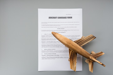 aircraft coverage form and an airplane model concept of travel insurance