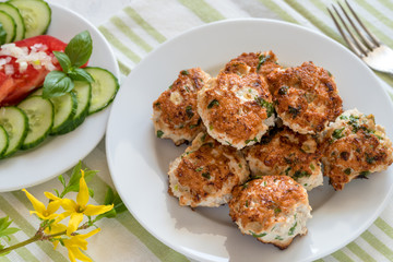Fried minced turkey cutlets on a plate.