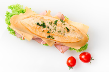 Sandwich with ham and vegetables isolated on white background
