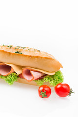 Sandwich with ham and vegetables isolated on white background