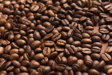 Closeup of coffee seeds, textured background