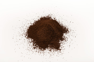 Ground coffee pile isolated on white background