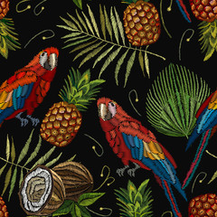 Embroidery parrot, palm tree leaves, pineapple, coconut tropical seamless pattern. Template for design of clothes. Fashionable embroidery tropical summer background