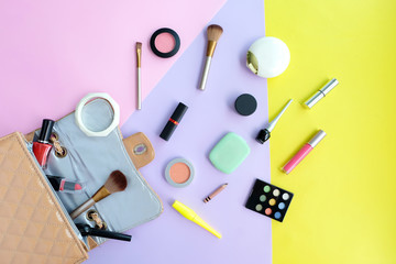 Professional makeup makeup pads Bags have sunglasses and.Fashion stylish clothes on Colorful background