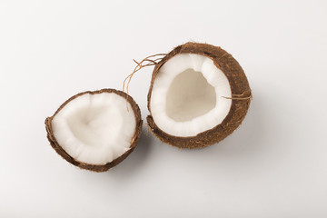 Fototapeta na wymiar Broken coconut isolated on white background