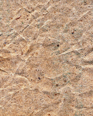 Crumbled brown paper background abstract
