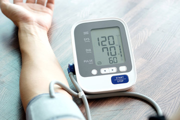 Human check blood pressure monitor and heart rate monitor with digital pressure gauge. Health care...