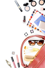 Woman bag stuff flat lay. Beauty accessories, passport, purse, sunglasses, travel concept.