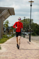 Healthy lifestyle - young man running