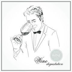 Sommelier, waiter, man holding glass of wine, tasting wine