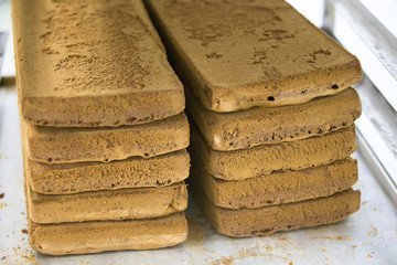 Sheets of biscuit for baking cake. Many layers of biscuit.Semi-finished cake